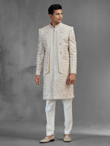 Beige silk open front sherwani with rich embroidery