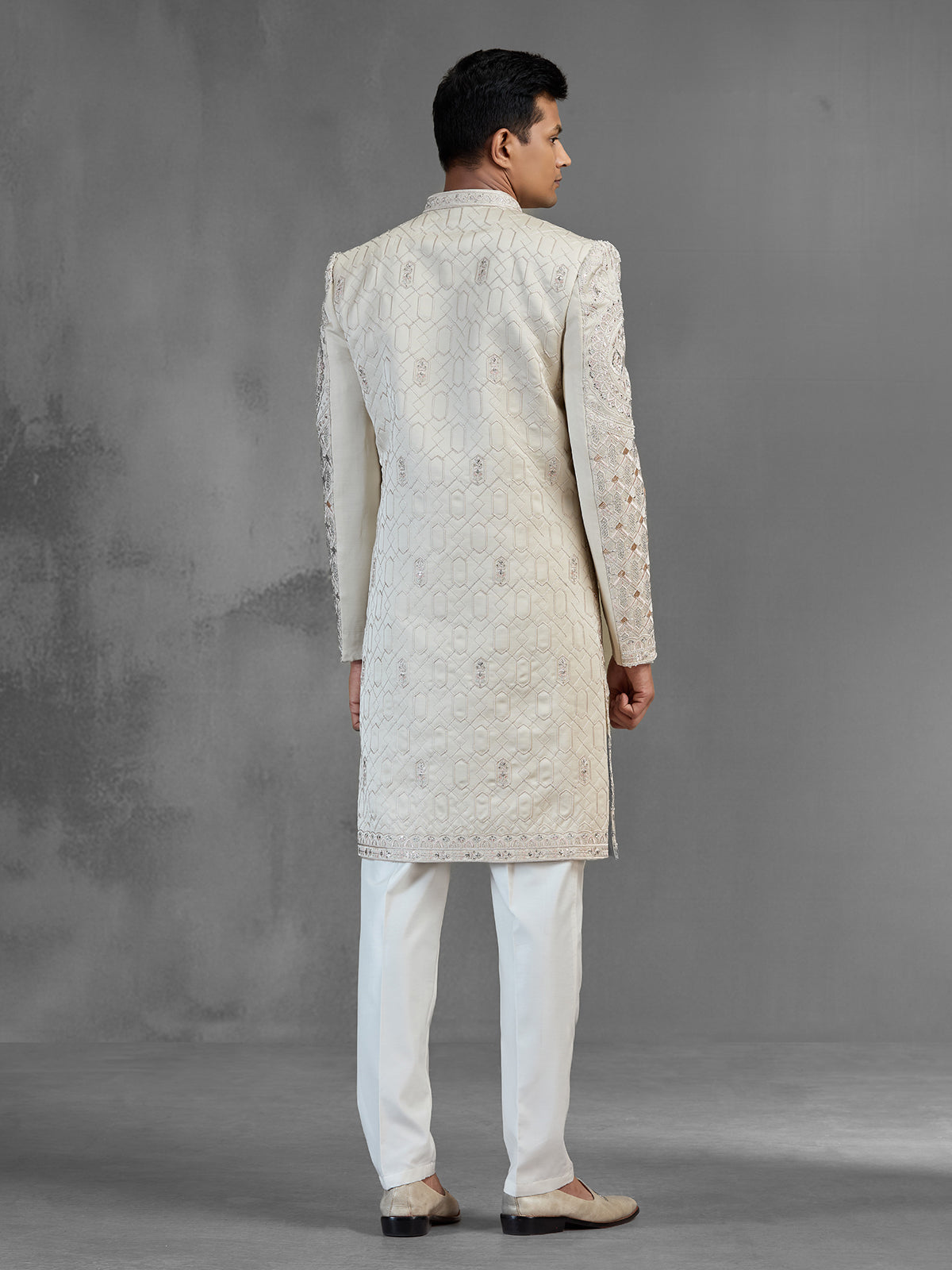 Beige silk open front sherwani with rich embroidery