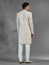 Beige silk open front sherwani with rich embroidery