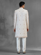 Cream silk open front sherwani with elegant detailing