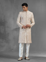 Rose gold raw silk sherwani with dense embroidery
