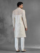 Cream gold raw silk sherwani with sequined peacocks