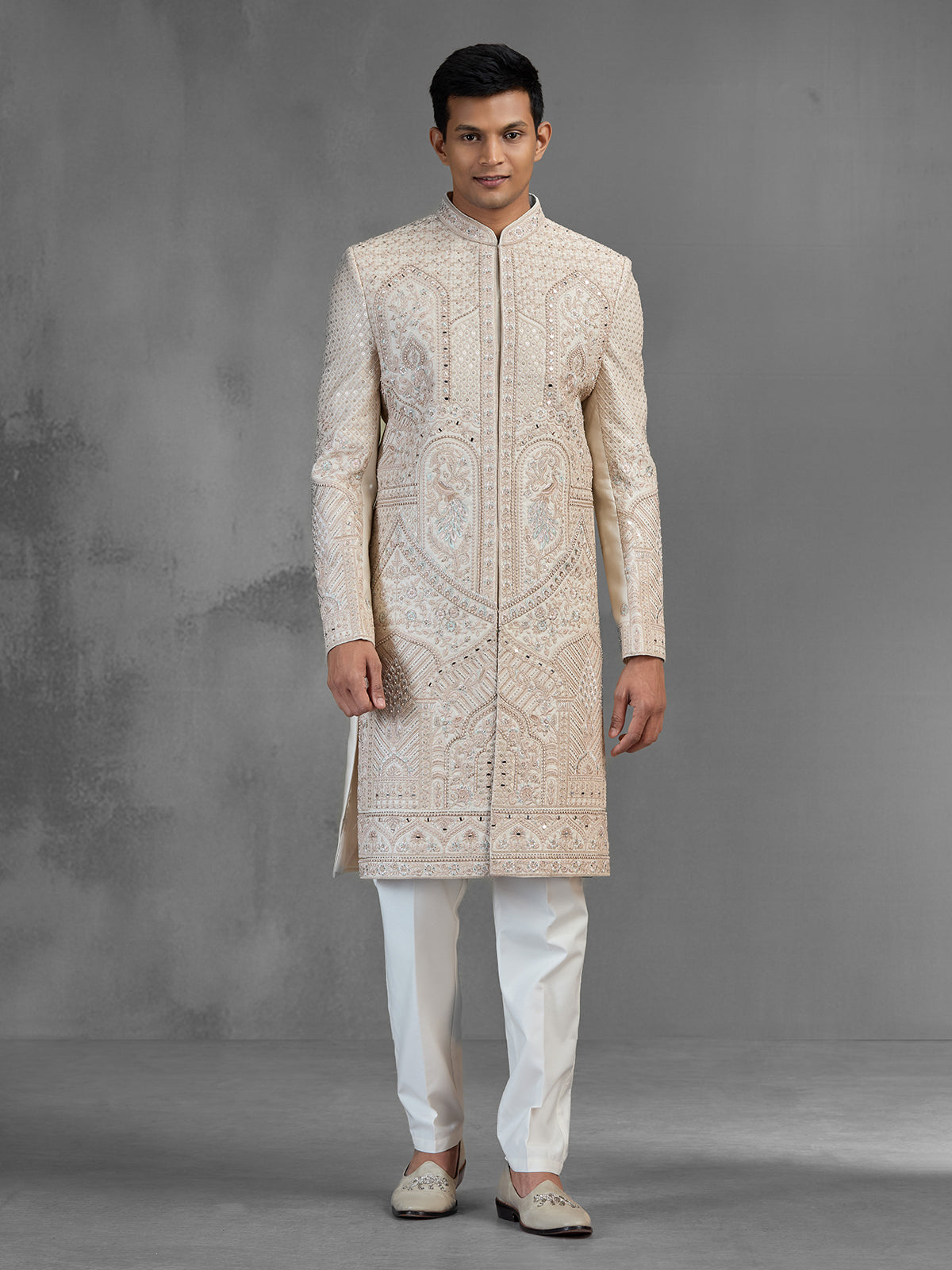 Cream gold raw silk sherwani with sequined peacocks