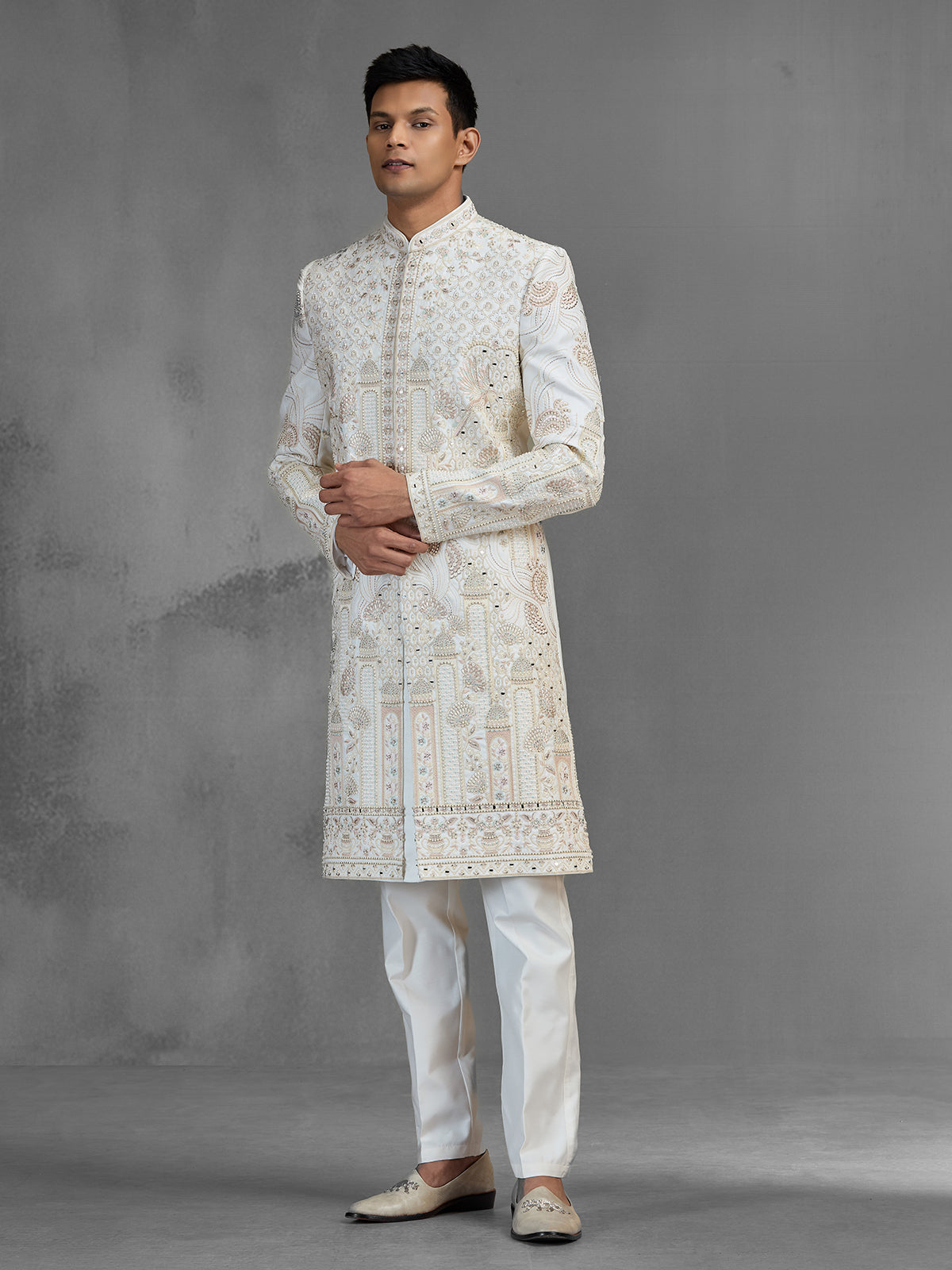 Ivory raw silk sherwani with jharokha paisley embroidery