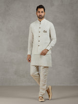 Beige linen waistcoat set with zari elephant embroidery