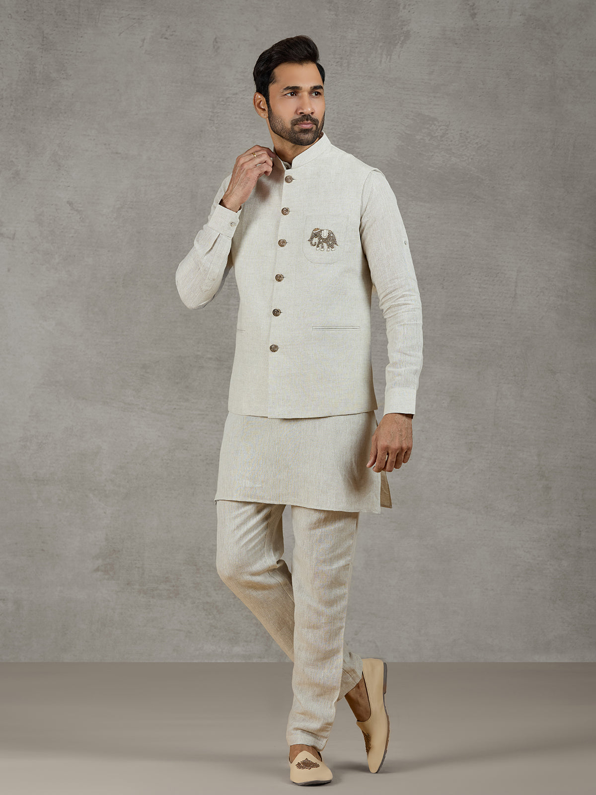 Beige linen waistcoat set with zari elephant embroidery