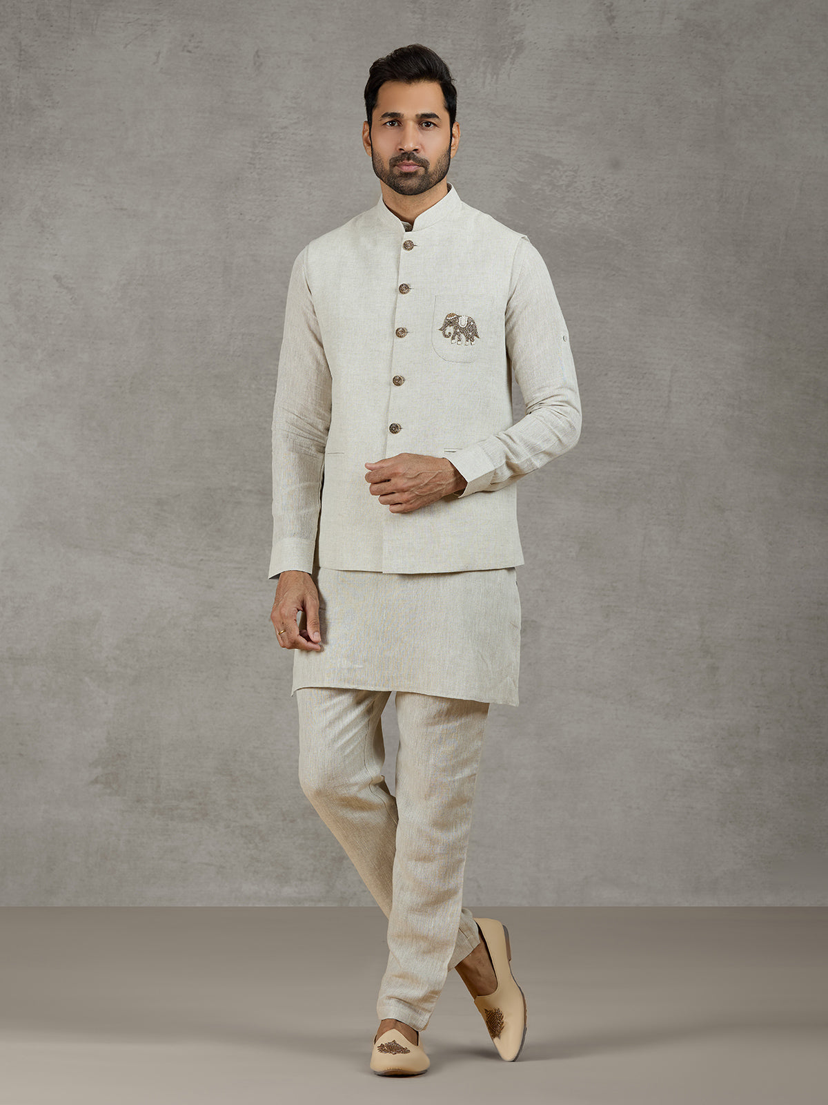 Beige linen waistcoat set with zari elephant embroidery