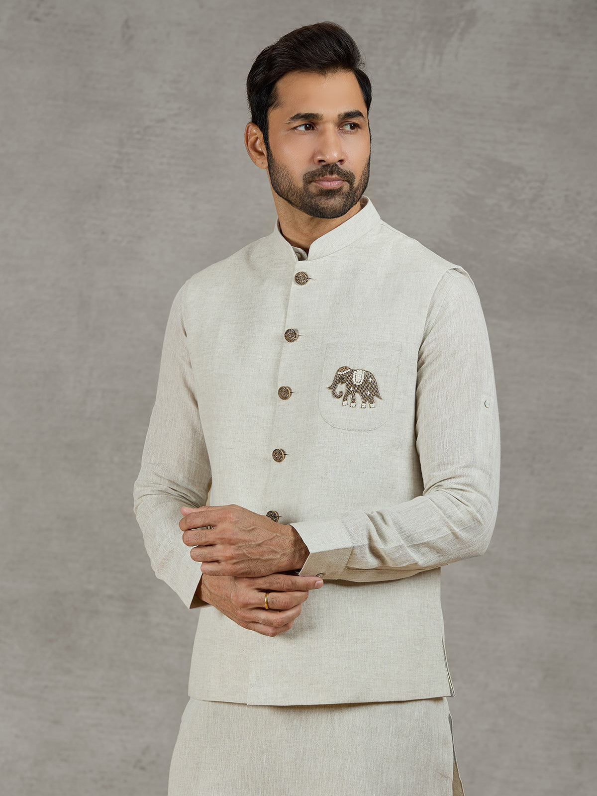 Beige linen waistcoat set with zari elephant embroidery