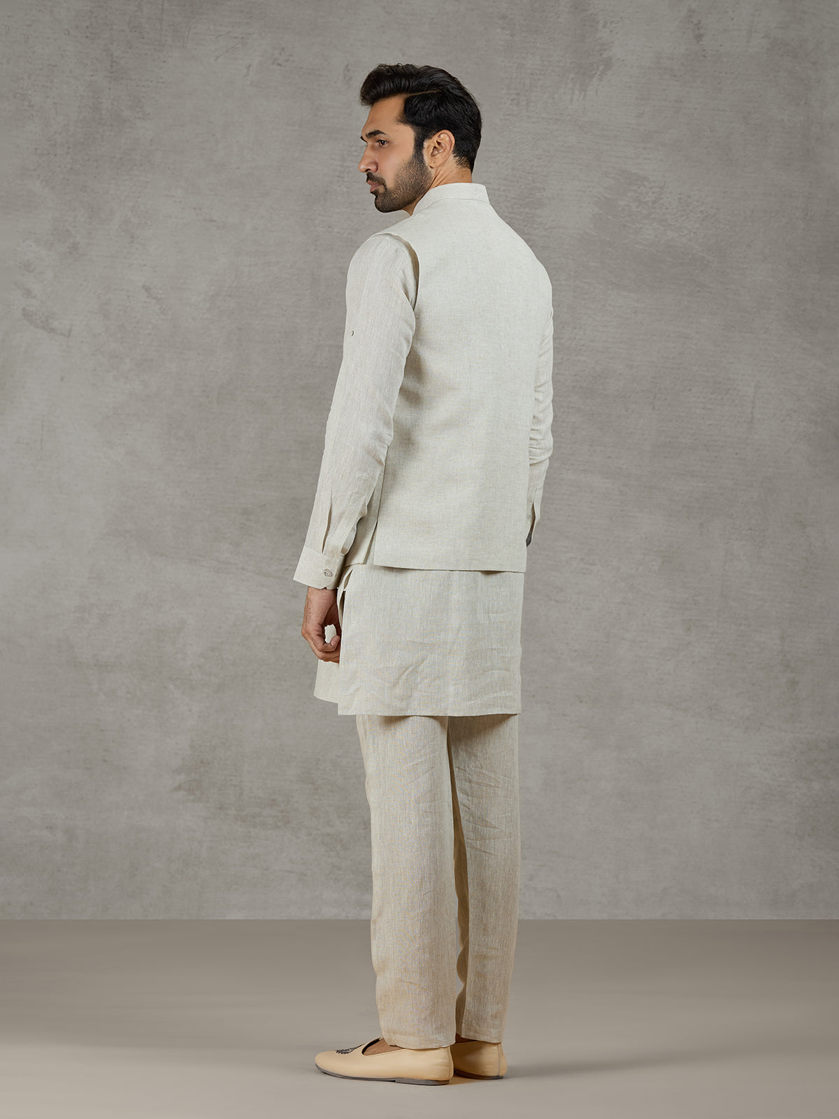Beige linen waistcoat set with zari elephant embroidery