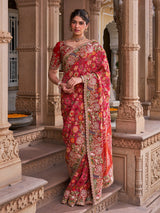 Fuchsia pink georgette saree with multicolor resham embroidery