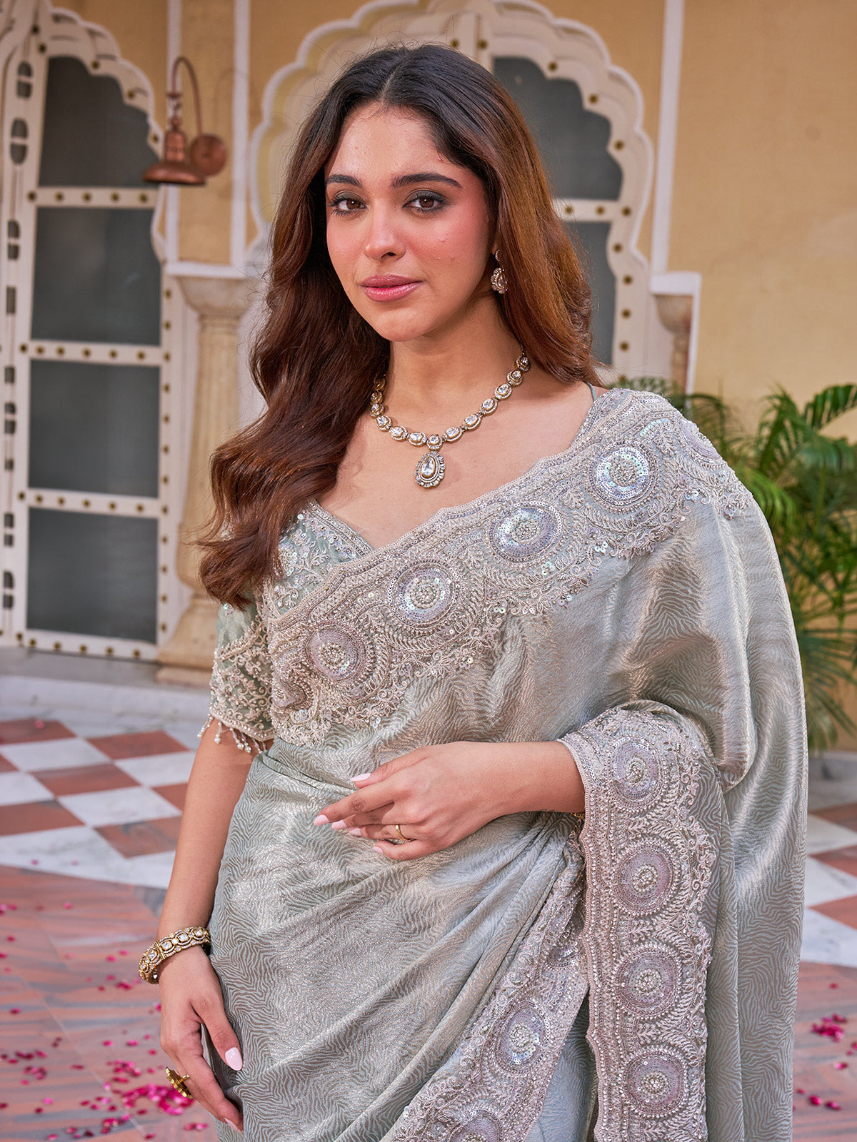 Sage green georgette silk saree with unstitched