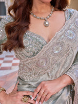 Sage green georgette silk saree with unstitched