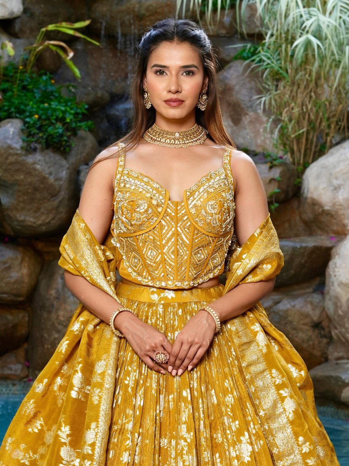 Mustard yellow brocade lehenga choli with zari work