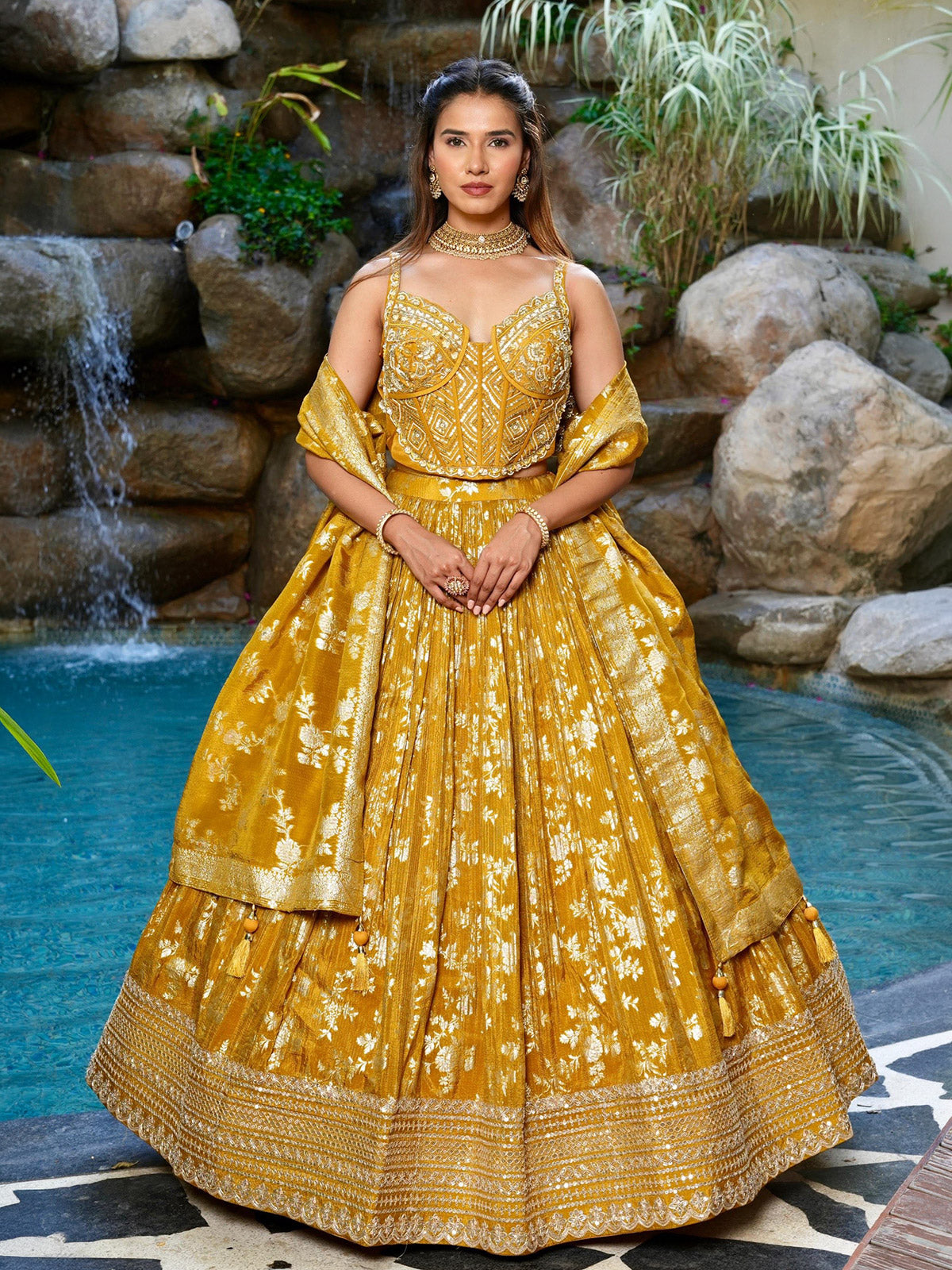 Mustard yellow brocade lehenga choli with zari work