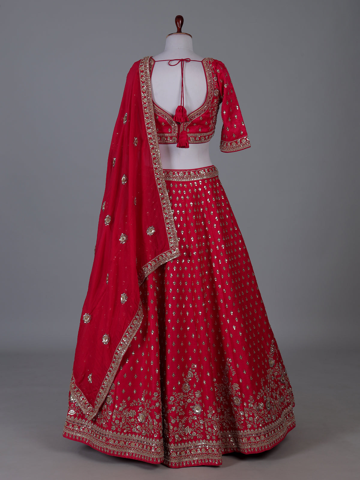 Magenta silk lehenga choli with detailed cutdana work