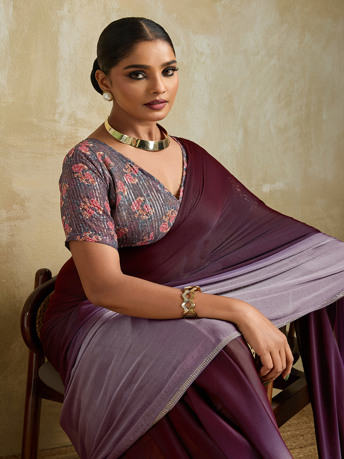 Wine shaded velvet chiffon saree with stone work