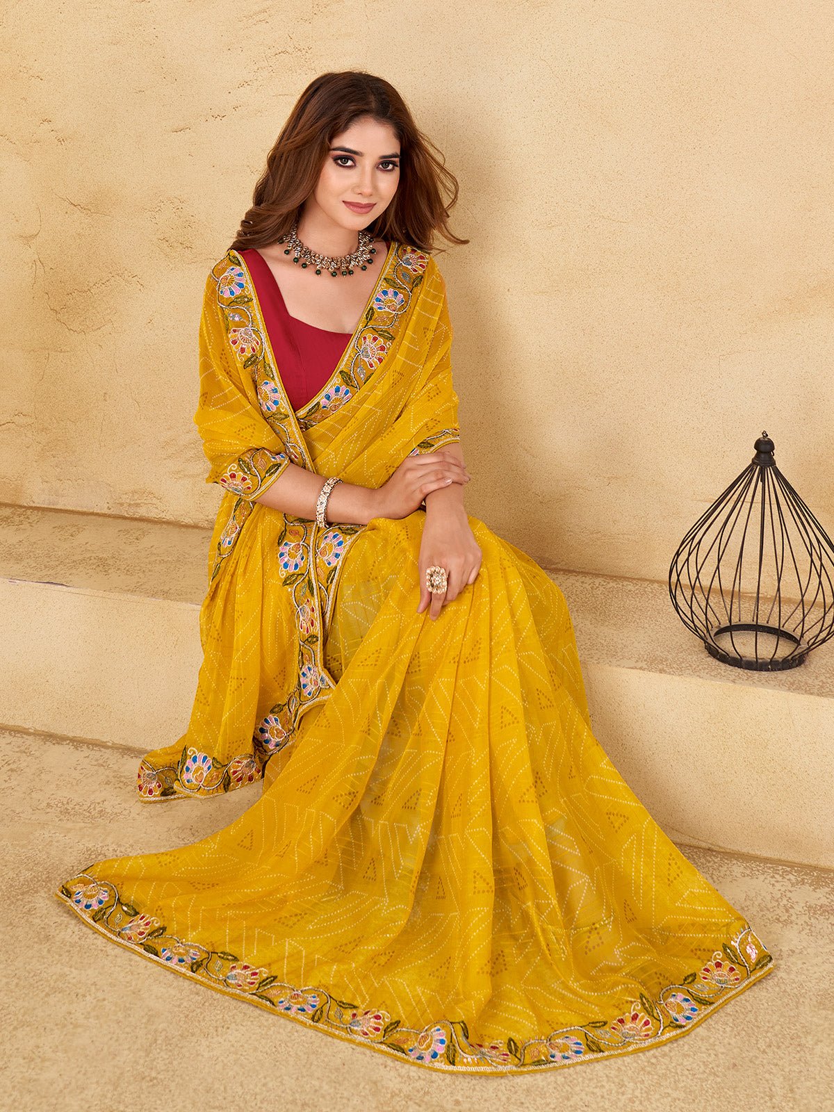 Yellow georgette printed saree with festive shimmer