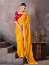 Mustard yellow georgette bandhej saree with sequins