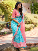 Sky blue malmal cotton saree with contrast detailing