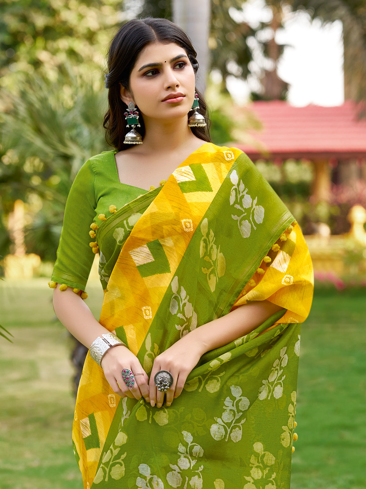 Mustard yellow malmal cotton saree with pum pum accents