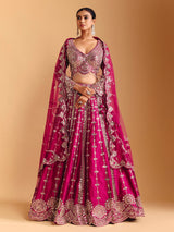 Deep rani pink raw silk lehenga choli with mirror embellishments