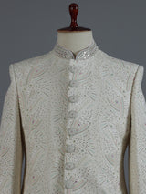 Cream chikankari sherwani with ornate collar detailing