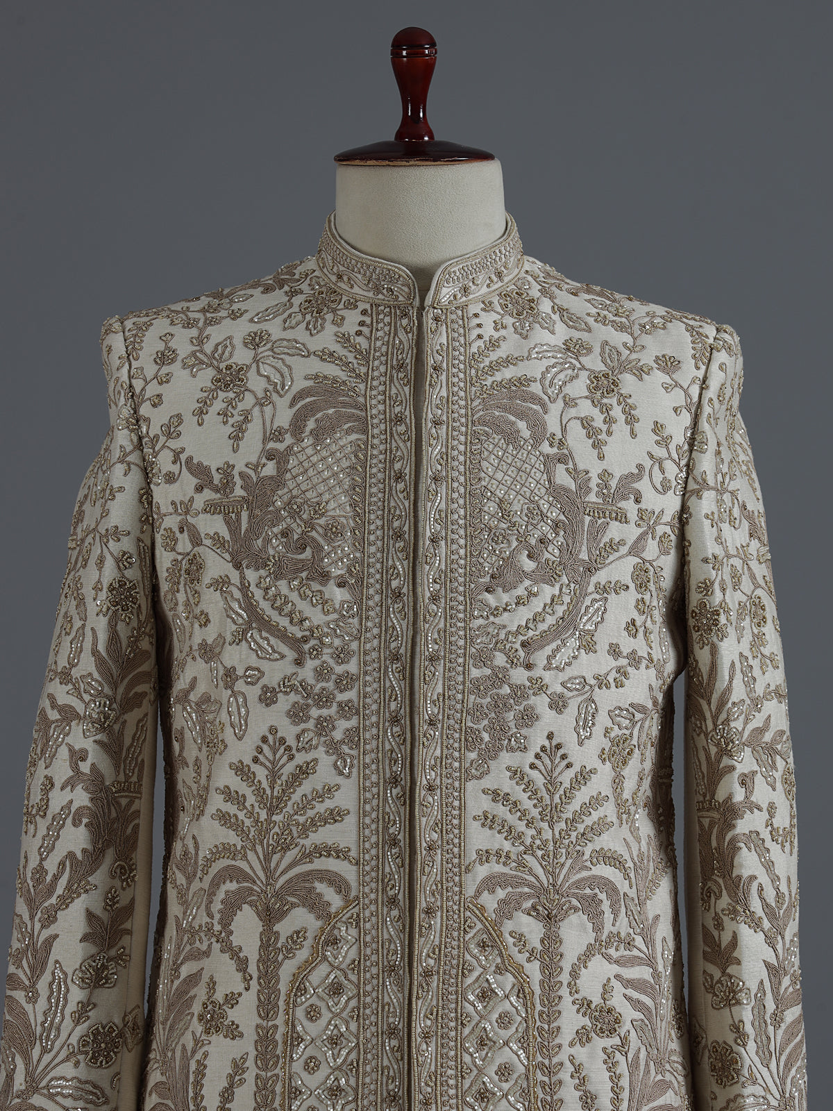 Cream raw silk sherwani with regal zardosi and sequins work