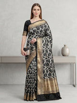Black banarasi silk saree adorned with elegant silver zari detailing