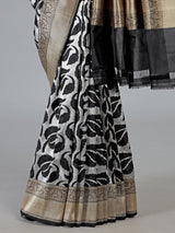 Black banarasi silk saree adorned with elegant silver zari detailing