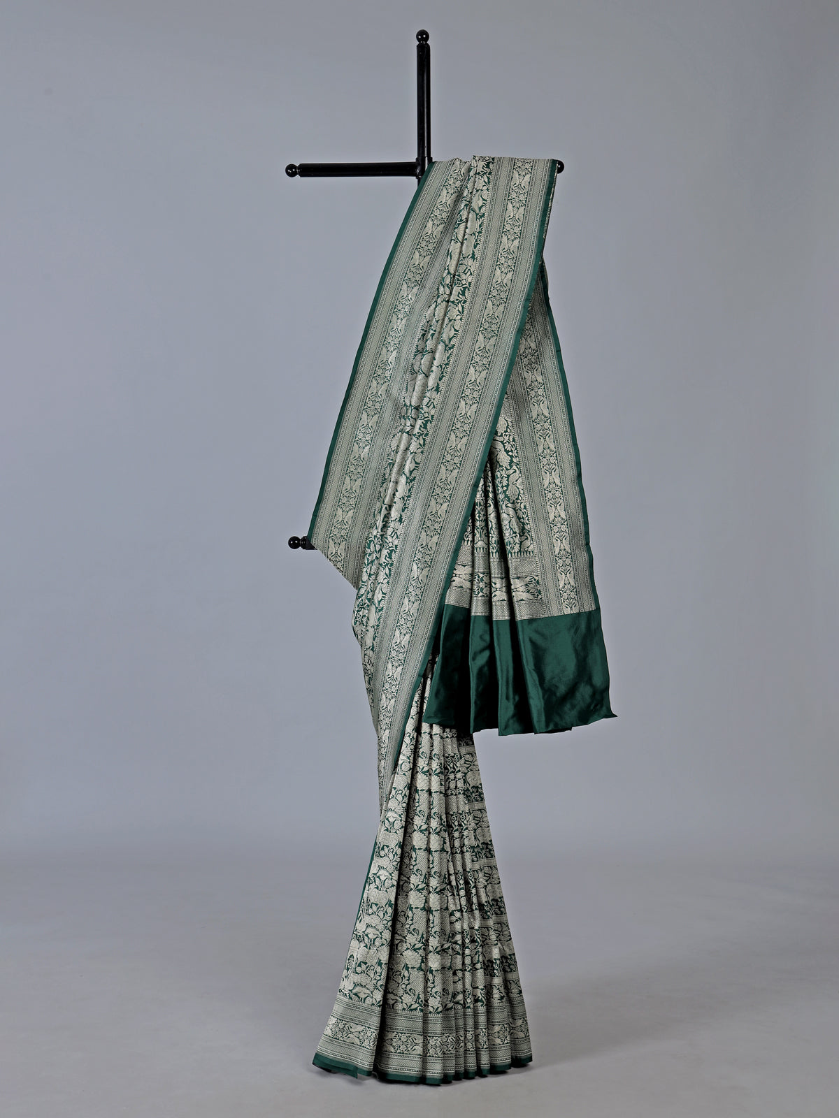 Dark green banarasi silk saree designed for wedding wear