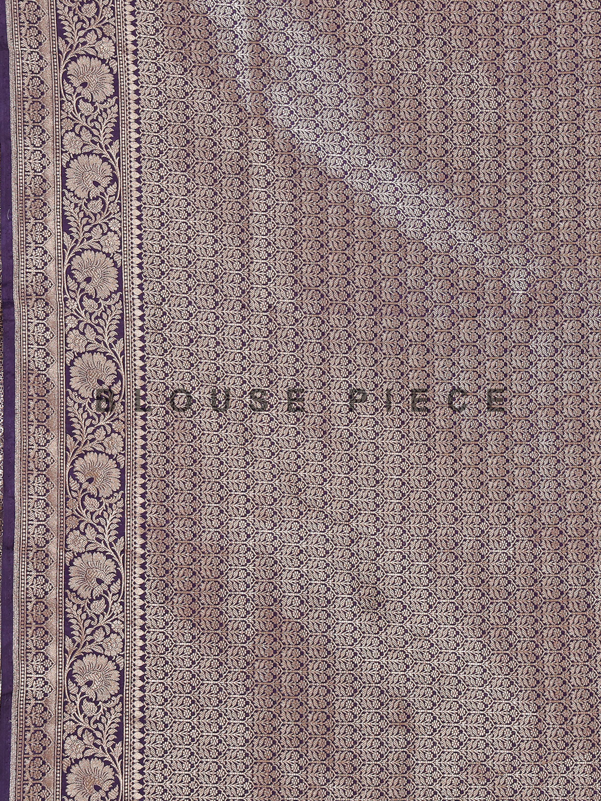 Purple banarasi silk saree featuring detailed zari work for weddings