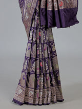 Purple banarasi silk saree featuring detailed zari work for weddings