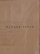 Beige banarasi silk saree highlighted with golden zari detailing