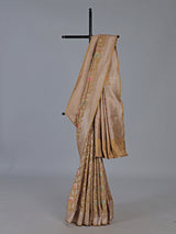 Beige banarasi silk saree highlighted with golden zari detailing