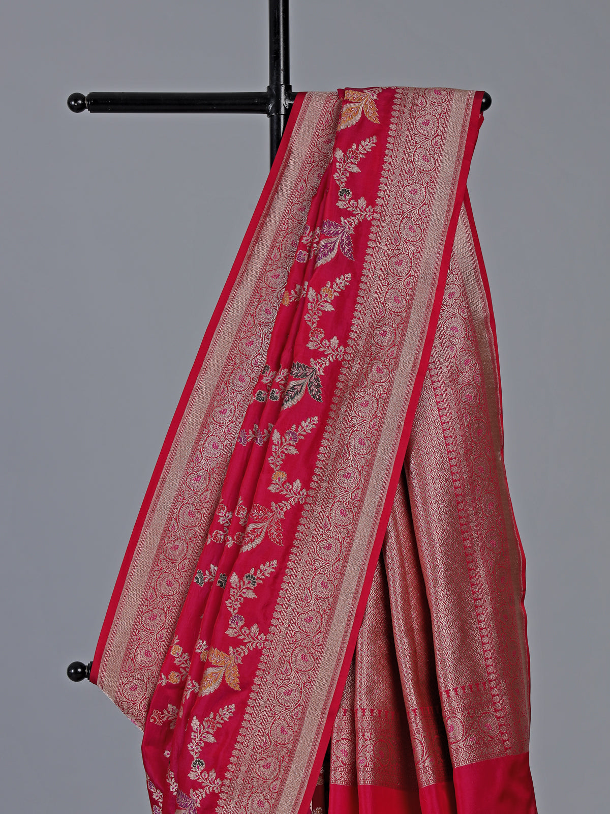 Red banarasi silk saree with golden zari detailing for wedding wear