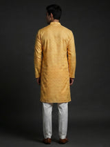 Yellow printed kurta suit in cotton silk for haldi