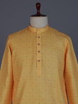 Yellow printed kurta suit in cotton silk for haldi