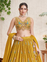 Mustard silk lehenga choli with peacock and deer motifs