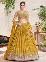 Mustard silk lehenga choli with peacock and deer motifs