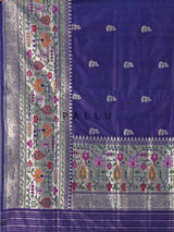 Purple banarasi silk saree with floral zari butti border