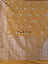 Dusty yellow banarasi silk saree with floral zari design
