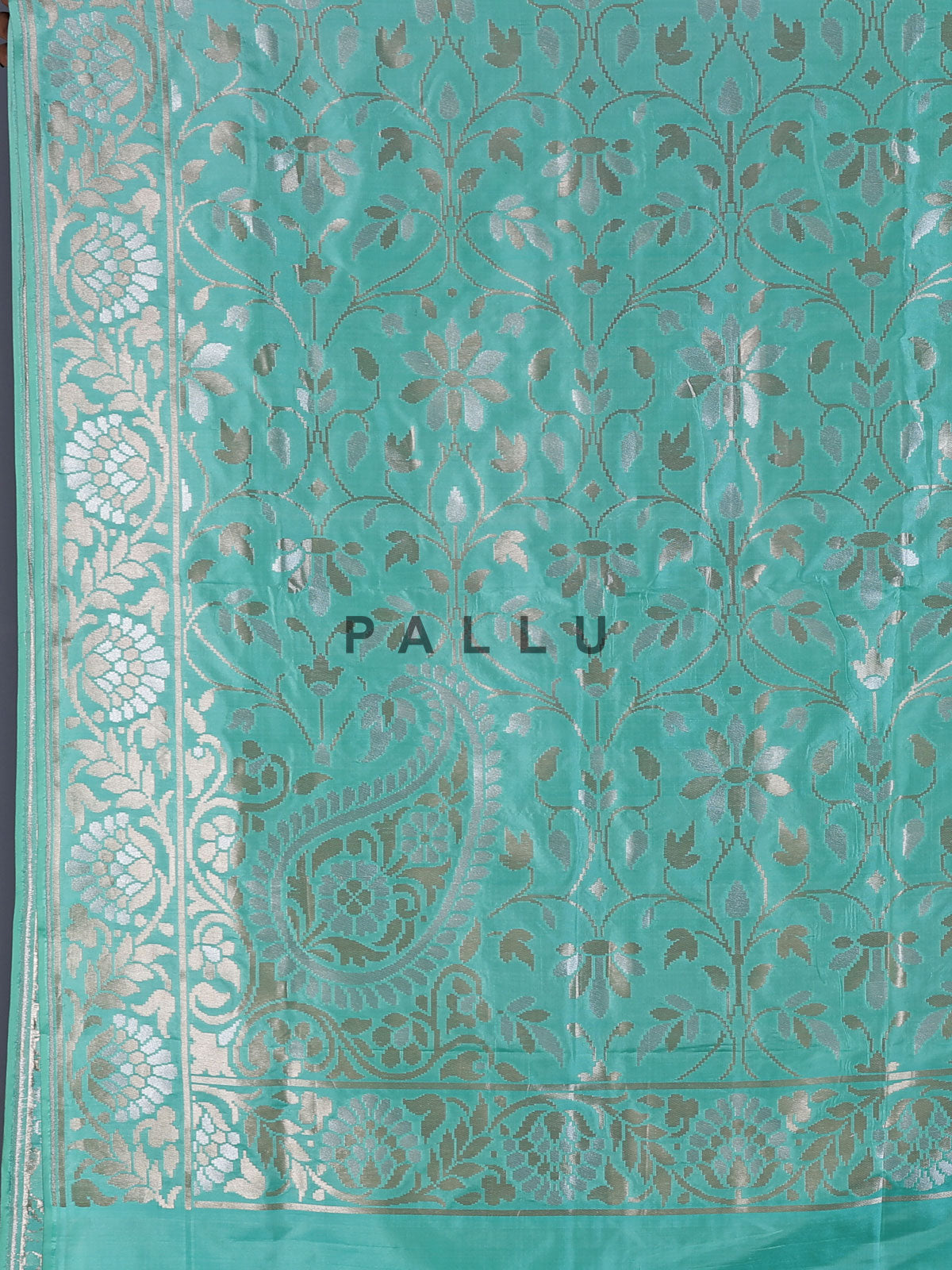 Mint green banarasi silk saree with classic zari detailing