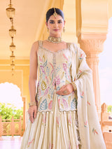 Cream silk lehenga choli with colorful motif embellishments