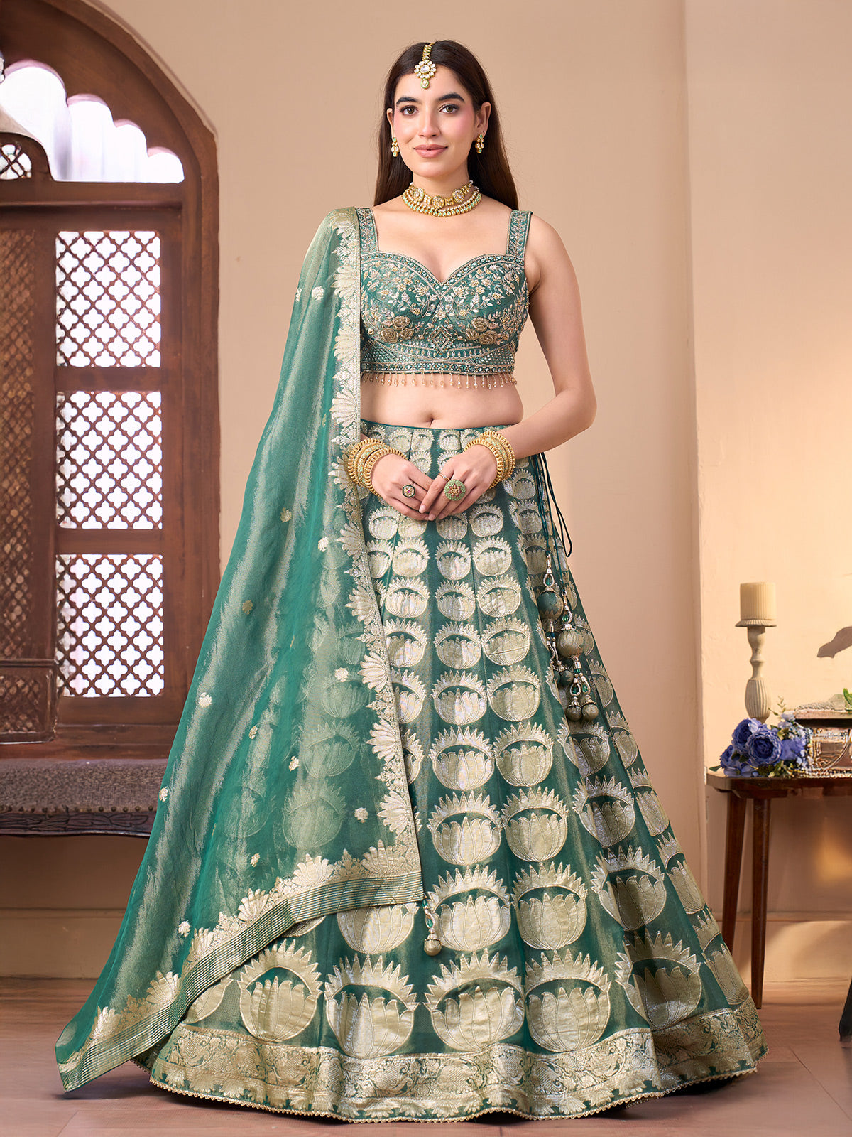 Pastel green silk lehenga choli with floral motifs