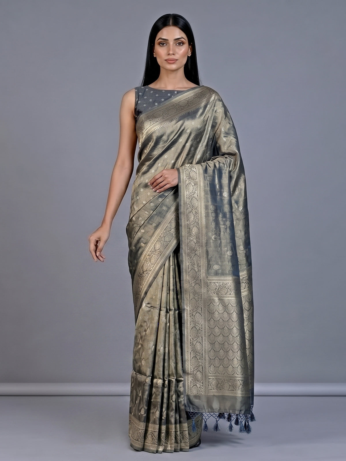 Grey tissue silk saree with refined butti and detailed pallu