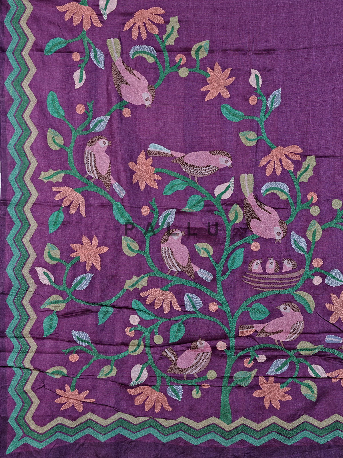 Purple tusser silk saree with graceful bird threadwork detailing