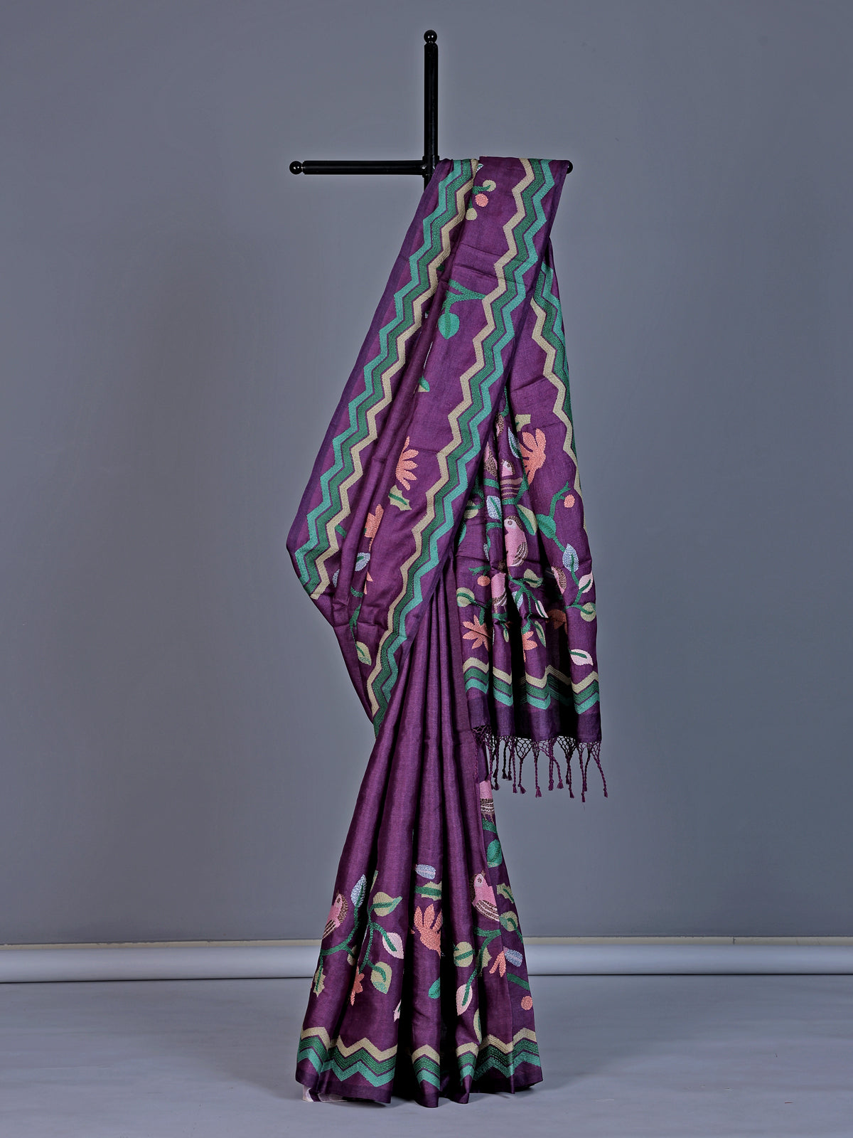 Purple tusser silk saree with graceful bird threadwork detailing
