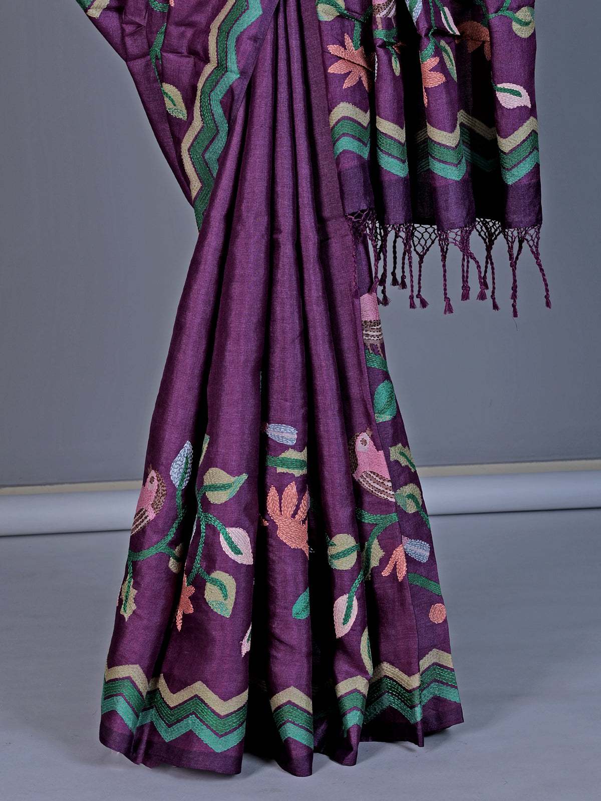 Purple tusser silk saree with graceful bird threadwork detailing