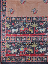 Soft peach art tusser silk saree with artistic prints and rich pallu