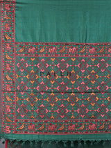 Deep green tusser silk saree with intricate animal motif artistry